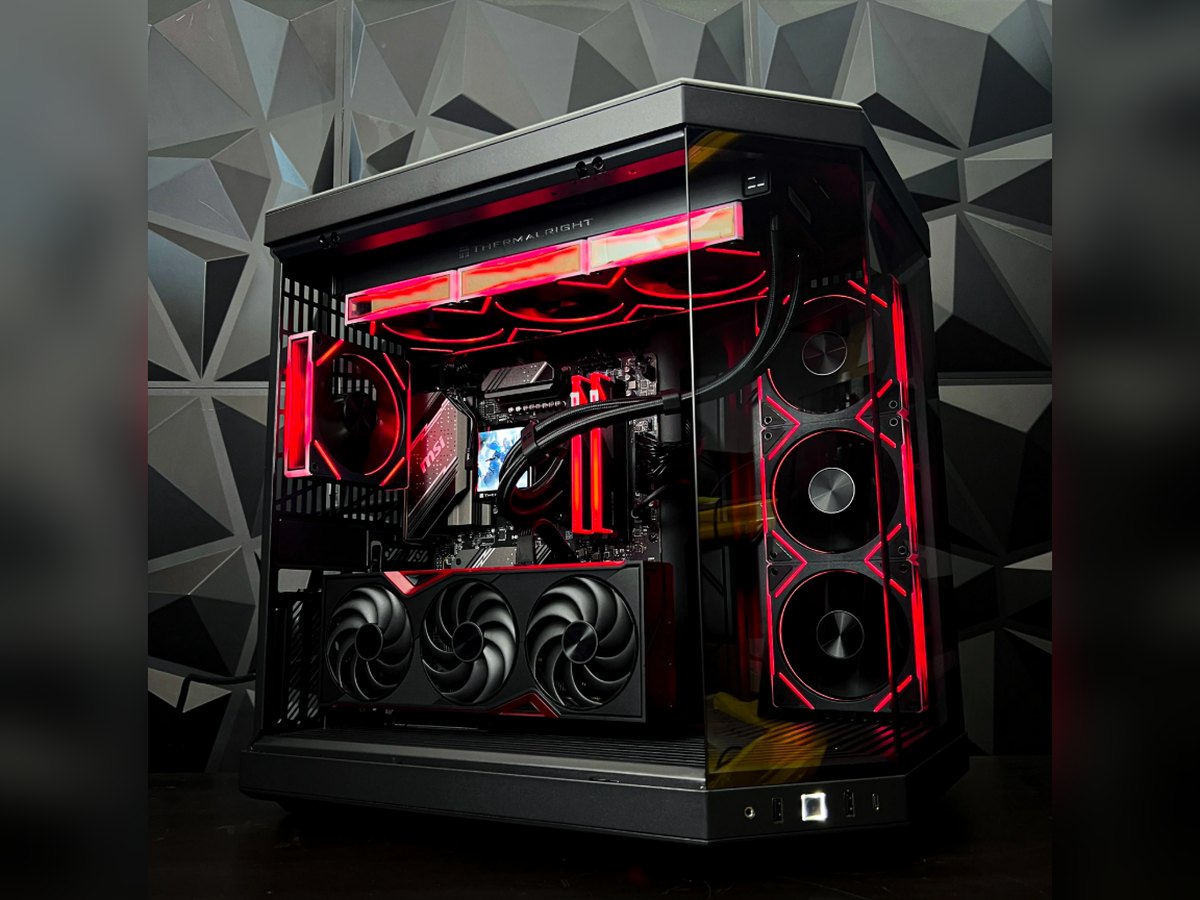 Custom gaming PC build with liquid cooling and red RGB lighting by Touch Media PJ